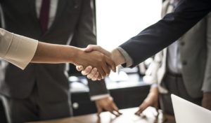 a group of people shaking hands