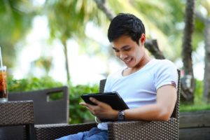 a person looking at a tablet