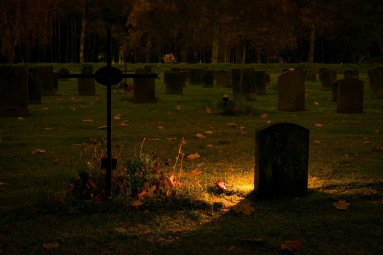 a cemetery at night
