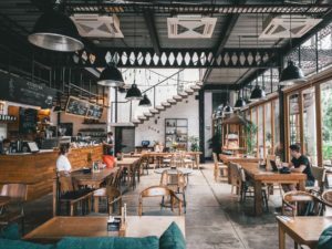 a restaurant with tables and chairs