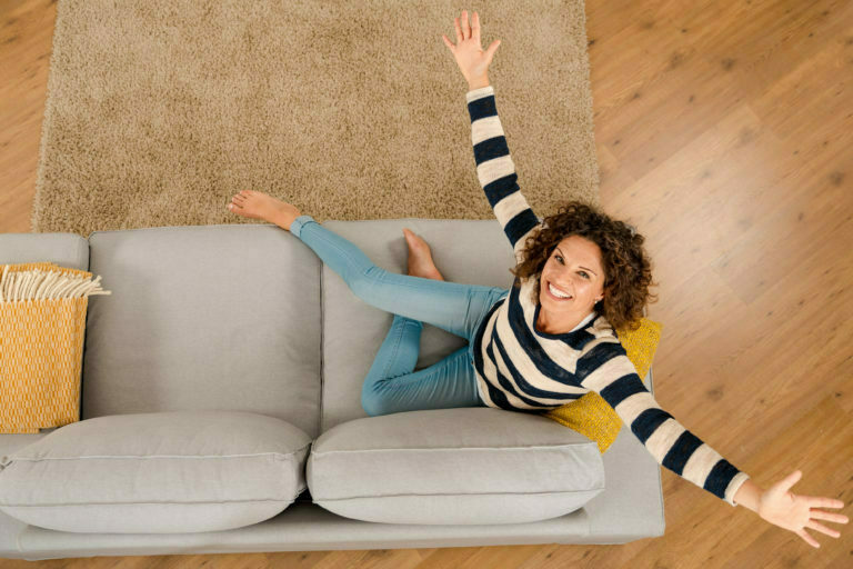 a person lying on a couch