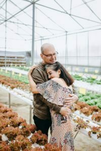 a person holding a baby