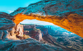 a large waterfall in a canyon