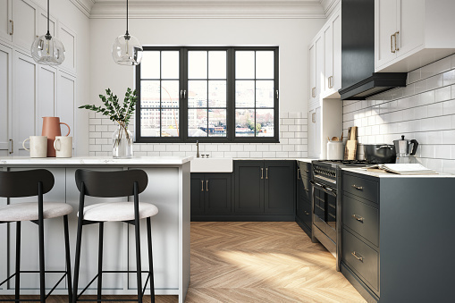 a kitchen with a table and stools