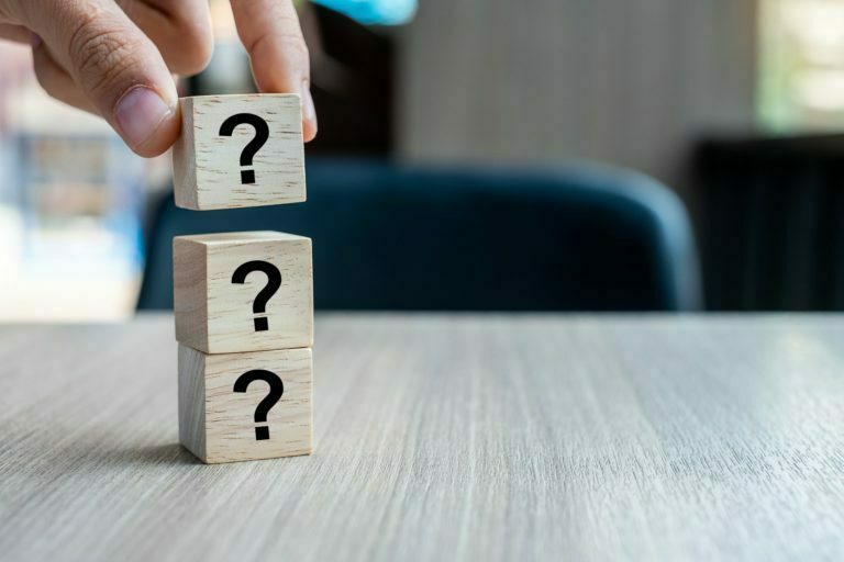a person holding a few blocks